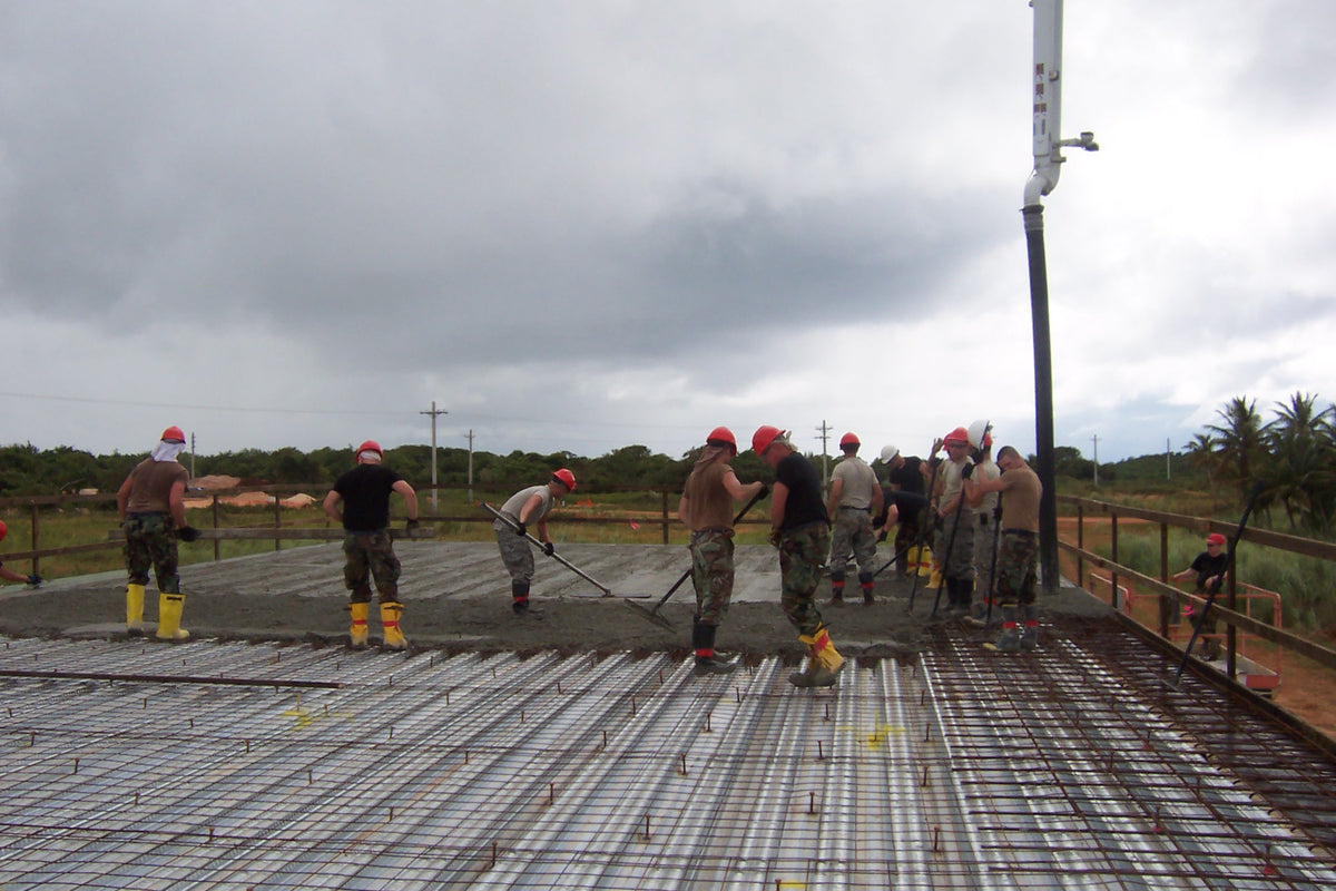 RED HORSE crew working on a concrete project